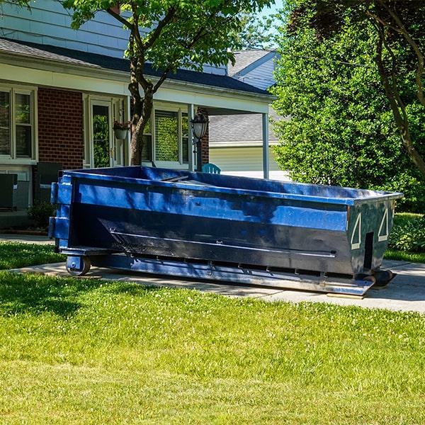 residential dumpsters can be placed on a driveway or yard, but preventative measures need to be required to avoid damage to the property